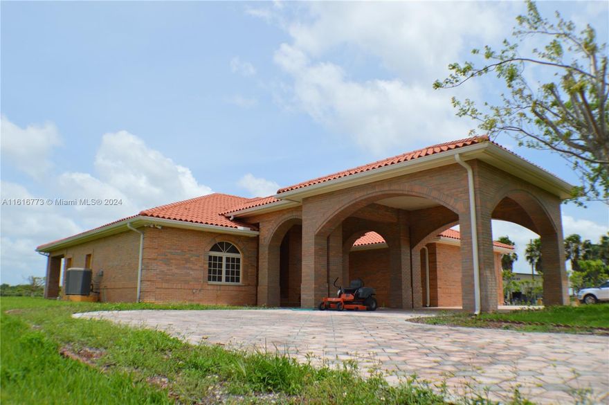 Top of the line everything for the construction of this home! High impact windows and doors! Exterior walls are all
double layered. Marble and granite tiles through out the entire home! 4 bedrooms 3 baths all huge in size! 3 Car
garage!! Home has never been officially lived in. Concrete fence for added security! Must see this property in
person to appreciate its beauty and durability! All on 20 Acres with Longan fruit trees with great annual income!
