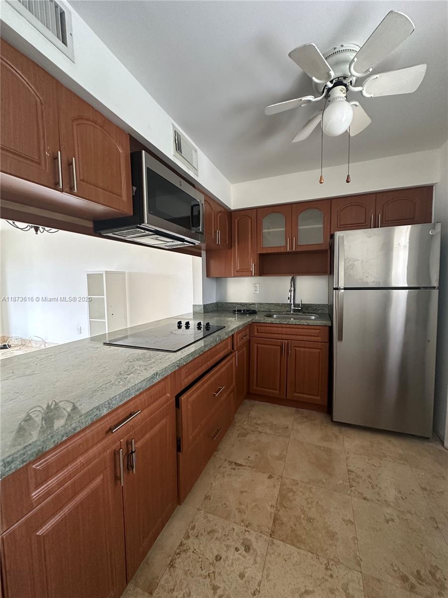 Beautifully updated 1 bed 1 bath in the heart of Aventura walking distance to the mall and restaurants. Completely updated with an open kitchen, tile floors throughout and a screened balcony. Community pool and laundry. Community has security patrol and Aventura Shuttle Service. No pets. 1 parking. As per condo association no more than two people can occupy the property. Washer/Dryer in the building NOT in the unit. $500 refundable deposit required by the condo association