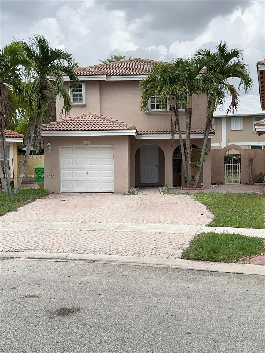Completely new interior. New appliances, New bathroom and Kitchen, Beautiful new Tile Floor and Laminate upstairs. One car garage and parking allowed in paved driveway. Large backyard. Great little community with common area swimming pool. Ready for a new tenant. First, Last and Secuity deposit.