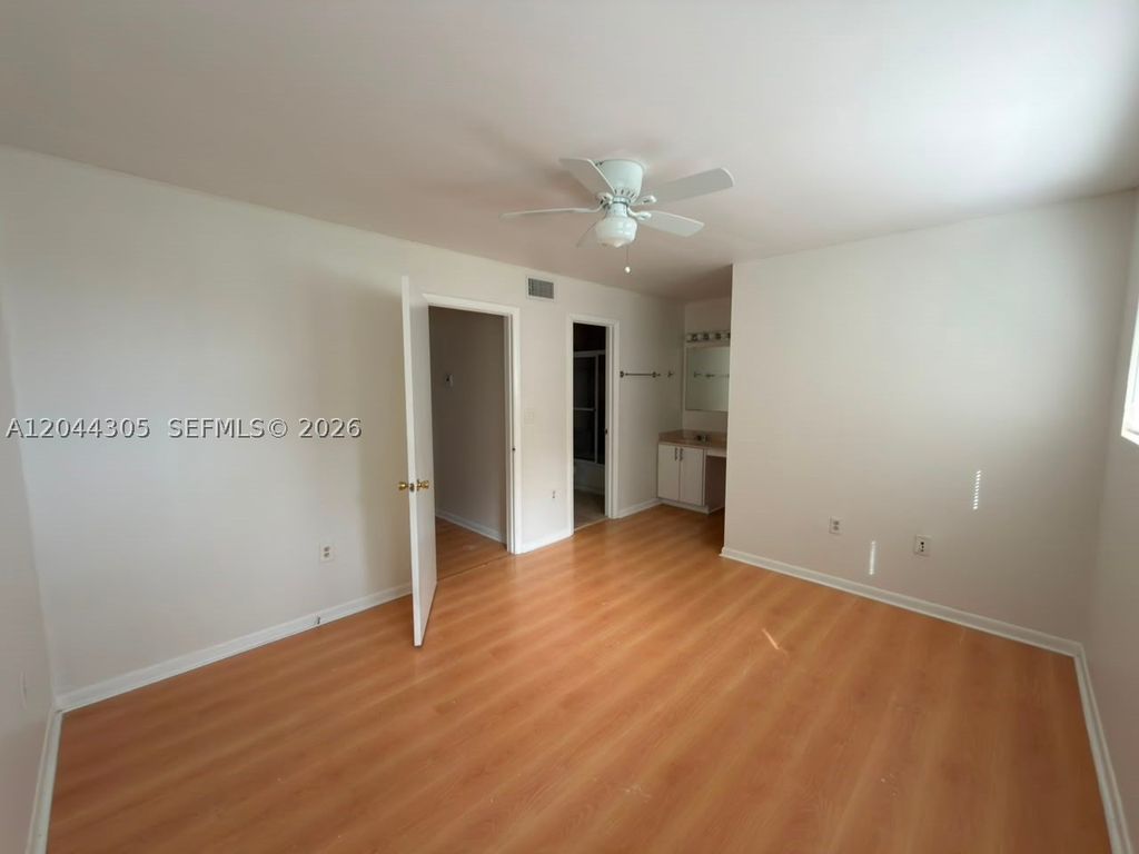 Photo of 862 Crystal Lake Dr, Deerfield Beach, FL 33064 (MLS # A12044305)