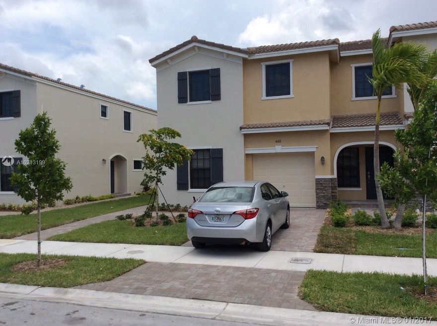 CORNER TOWNHOME, ORCHID MODEL, FULLY UPGRADED WITH NEW KITCHEN, TILE, MARBLE COURTER TOPS IN ALL BATHROOMS, BLINDS IN ALL WINDOWS, NEW CARPETS AND FULL WASHER AND DRYER. THE UNIT COMES WITH A COVERED GARAGE WITH REMOTE CONTROL AND  SPACE FOR A SECOND CAR ON THE DRIVEWAY. THE TOWNHOME IS A CORNER UNIT WITH THE MAIN ENTRANCE ON THE SIDE AND WITH ADDITIONAL GRASS AREA. THE ROOM ON THE 1ST FLOOR COMES WITH A FULL BATHROOM.RECENTLY RENOVATED SHOPPING CENTER NEXT DOOR W CHASE & WINN-DIXIE. COMMUNITY POOL!