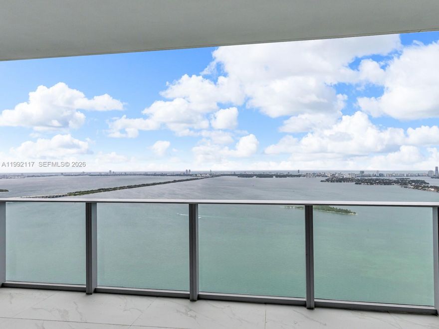 SPECTACULAR FULLY FURNISHED, BRAND-NEW RESIDENCE AT ARIA RESERVE MIAMI, THE NEWEST ARCHITECTURAL ICON ON BISCAYNE BAY. THIS LINE 02 UNIT OFFERS 3 SPACIOUS BEDROOMS, 3 FULL BATHROOMS, A VERSATILE DEN, AND BREATHTAKING 180-DEGREE PANORAMIC WATERFRONT VIEWS. ENJOY 2 ASSIGNED PARKING SPACES AND RESORT-STYLE AMENITIES: BAYFRONT POOLS & SUNDECKS, FULL-SERVICE FITNESS CENTER & YOGA STUDIO, SPA, STEAM ROOM & WELLNESS AREAS, TENNIS & BASKETBALL COURTS, PRIVATE MARINA WITH WATER ACCESS, AND LOUNGE, SOCIAL CLUB & COWORKING SPACES. LOCATED IN EDGEWATER, MINUTES FROM WYNWOOD, DESIGN DISTRICT, DOWNTOWN & MIAMI BEACH. LUXURY, COMFORT, AND THE ULTIMATE MIAMI WATERFRONT LIFESTYLE.