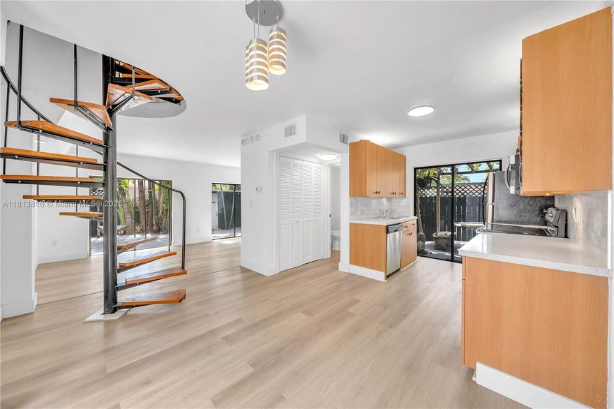 This spacious mediterranean-style townhouse offers elegance and modern comfort with bright living spaces. It features three bedrooms, each with a private balcony. The master suite opens to a 650 sqft private terrace, perfect for relaxation or entertaining. The home boasts all-new appliances, including a brand-new AC, and a modern kitchen with ample space. Stylish bathrooms with vessel sinks and frameless glass showers add a touch of luxury,while the spiral staircase enhances the home's unique charm. Conveniently located just three blocks from US1, the property is close to Brito School, the Grove area, top restaurants, and public transportation options like buses and MetroRail. This quiet neighborhood offers the perfect blend of peaceful living and easy access to Miami’s best attractions.