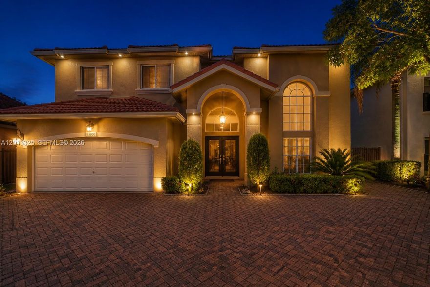 Stunning 4/3.5 turnkey home in the desirable Venezia Lakes, Kendall, located on a serene lake. This meticulously maintained property features new full interior and exterior paint, new AC, new impact windows, and a resurfaced pool, oversized concrete style porcelain floors. The expansive paver driveway has been upgraded to allow more spacious parking, the entire home boasts brand-new concrete-style floors along with remodeled bathrooms. Additional highlights include a whole-home generator for peace of mind during hurricane season. Bring your boat or jet ski, lake is motorized friendly. Don't miss this move-in-ready gem! Pls send Highest And Best ! Very sought after community! Easy to show, Lender Credit for Buy down subject to offer ! Easily Add a bedroom on first floor.