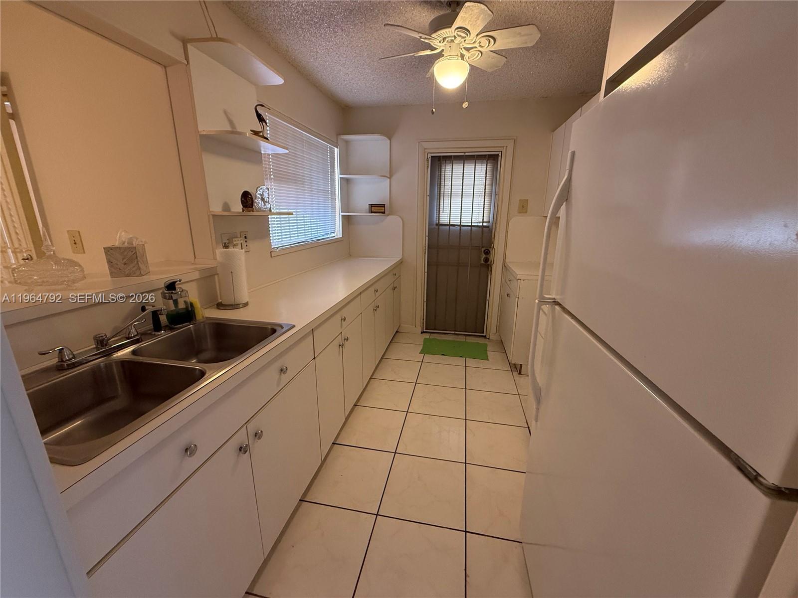 HOMES OF VERSAILLES CONDO - Residential