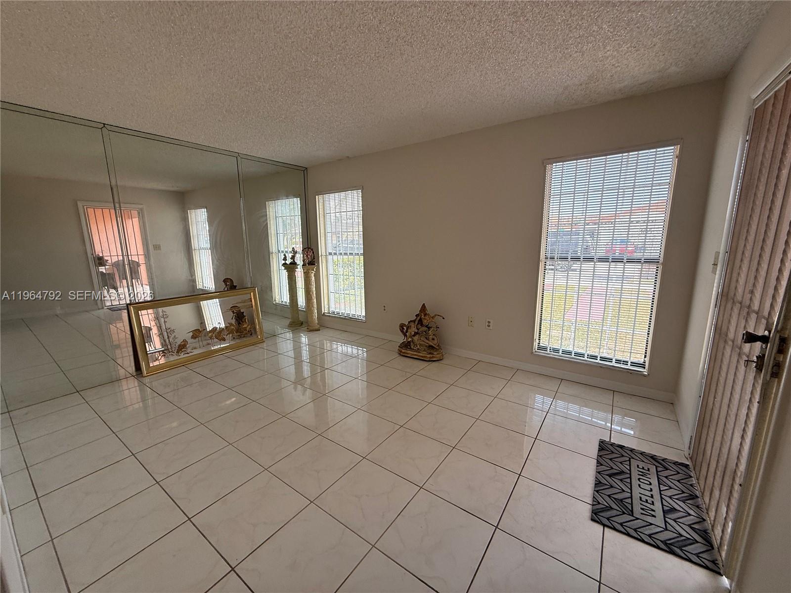 HOMES OF VERSAILLES CONDO - Residential