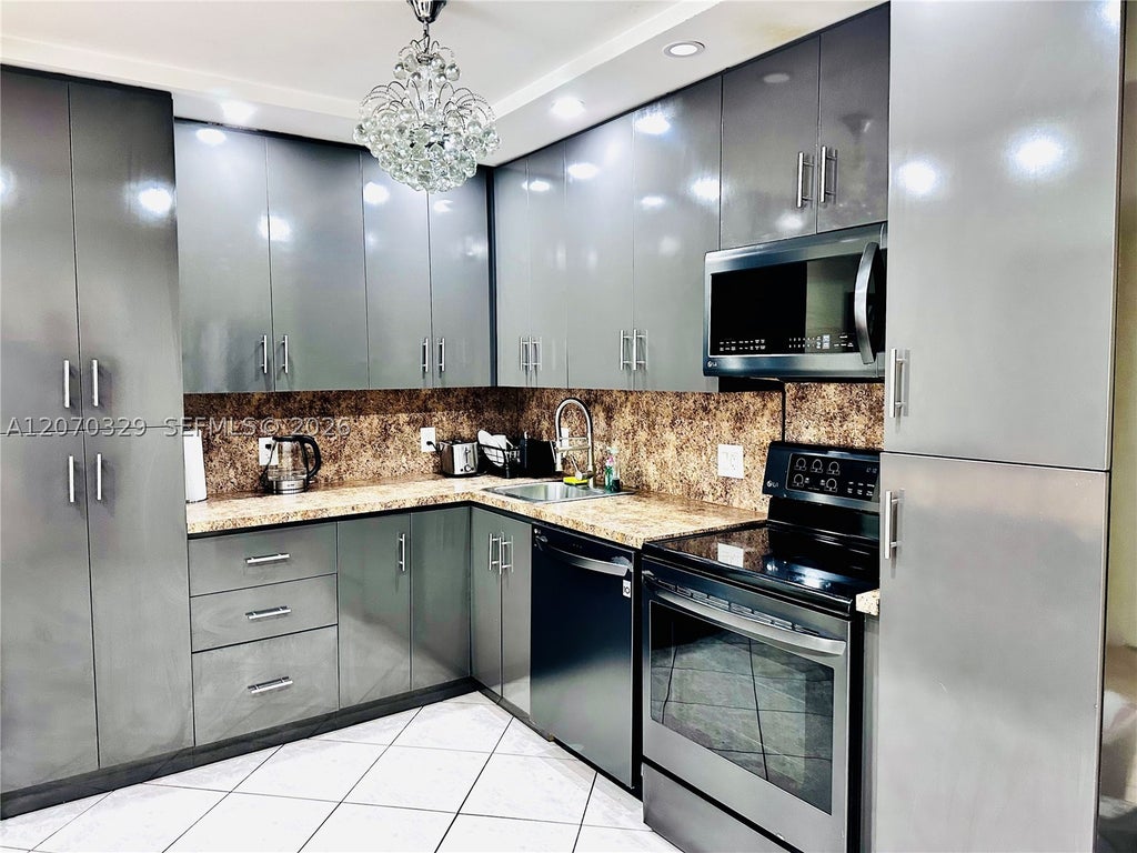 Photo of 1817 S Ocean Dr #823, Hallandale Beach, FL 33009 (MLS # A12070329)