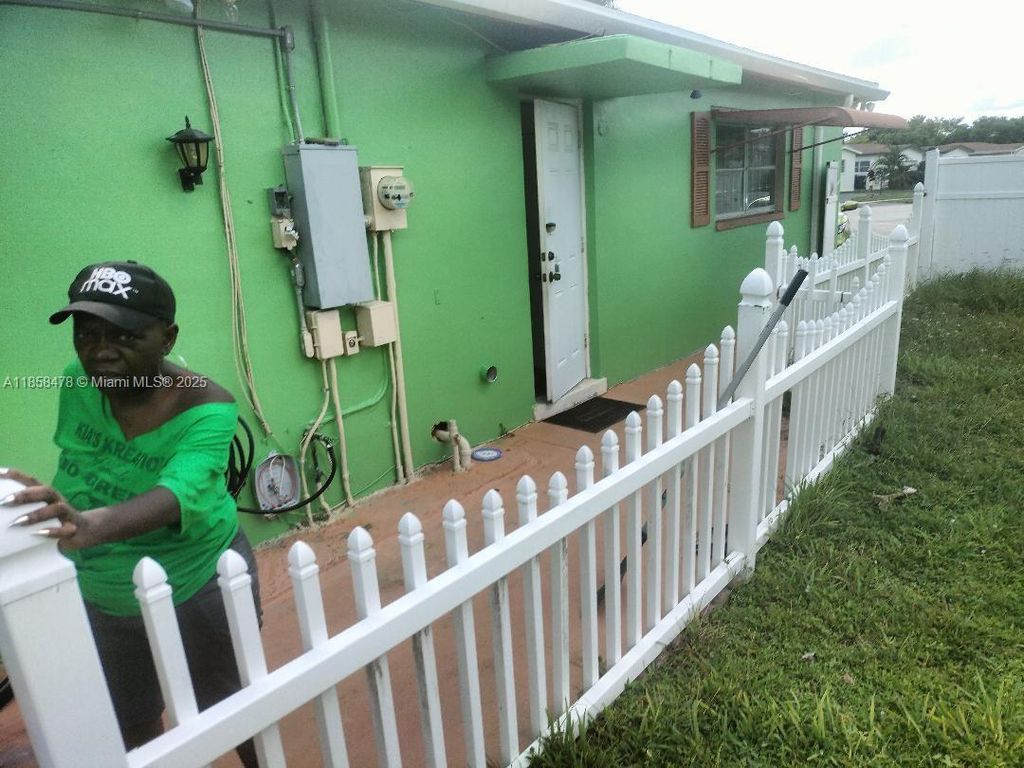 Photo of 3991 NW 47th Ave #B, Lauderdale Lakes, FL 33319 (MLS # A11858478)