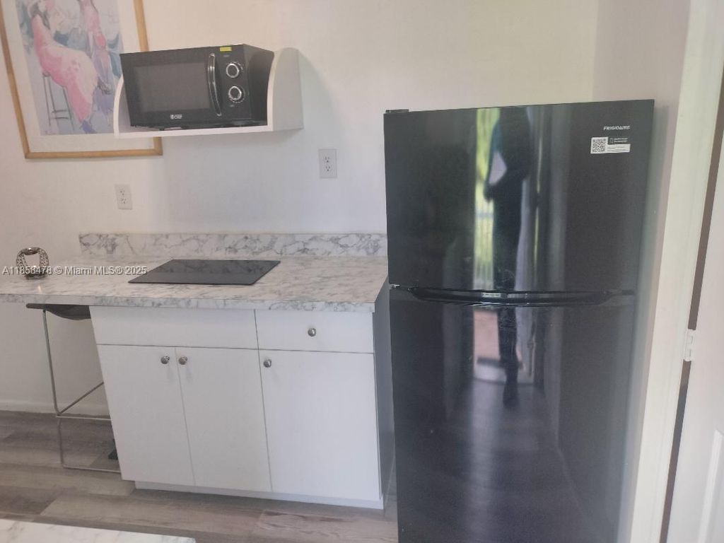 Photo of 3991 NW 47th Ave #B, Lauderdale Lakes, FL 33319 (MLS # A11858478)