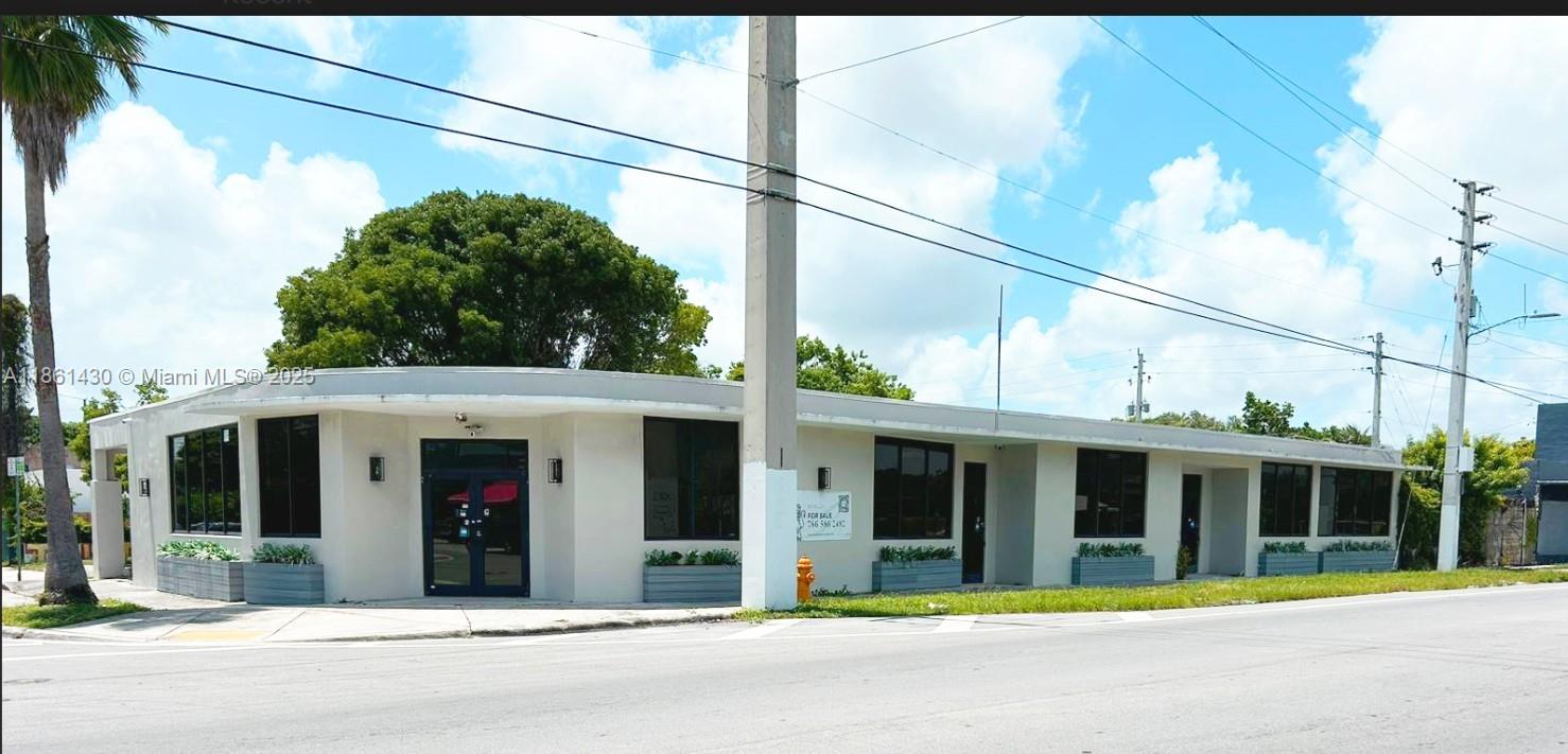 This 1,396 sq. ft. corner property is strategically positioned on NW 2nd Avenue, just two blocks west of the Miami Design District and two blocks north of Wynwood, two of the city's most vibrant and rapidly growing neighborhoods. Offering exceptional visibility and accessibility, the location is ideal for businesses seeking a high-traffic, high-potential area. This site is surrounded by major transportation links, retail centers, and popular dining destinations, providing both convenience and prestige. The property is available under a Triple Net (NNN) lease and has been approved by the City for use as a yoga studio under current zoning regulations.