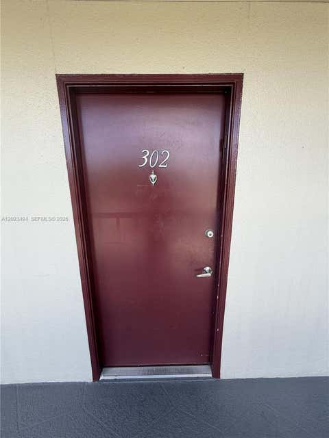 Photo of 13155 SW 7th Ct #302E, Pembroke Pines, FL 33027 (MLS # A12023494)