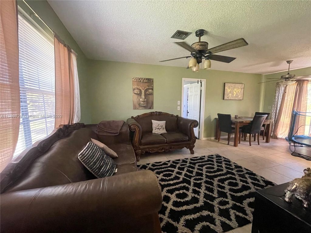 Photo of 885 SE Odonnell Ln, Port Saint Lucie, FL 34983 (MLS # A11289729)
