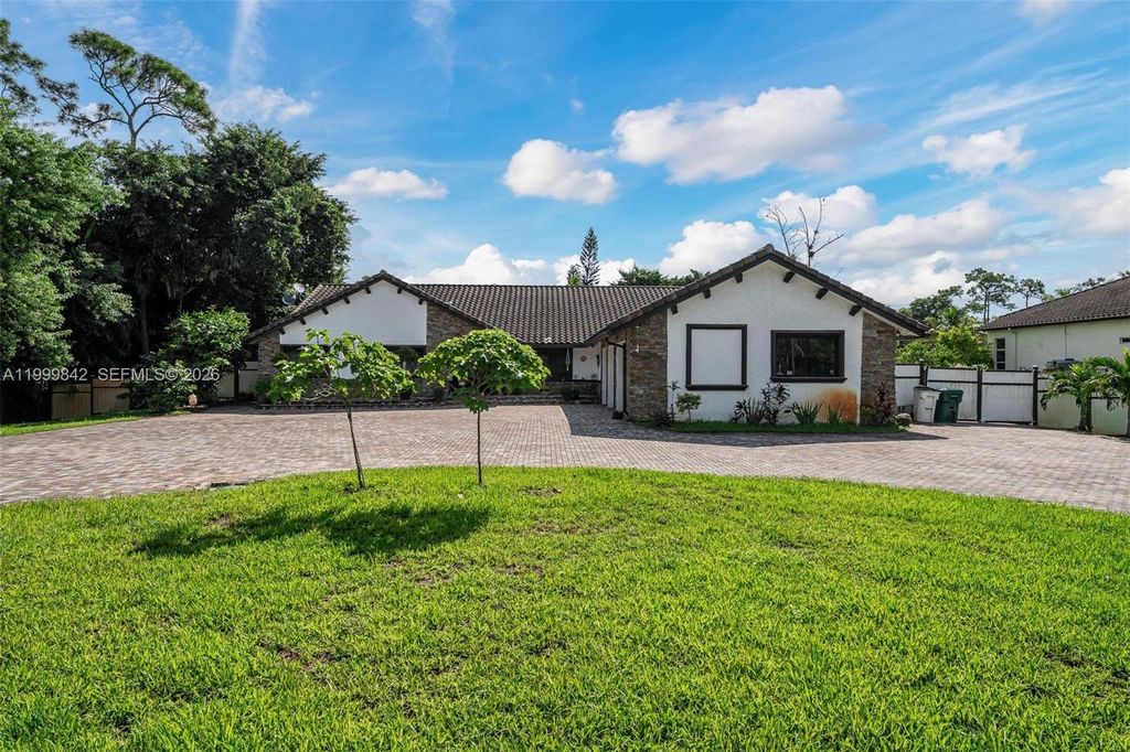 Photo of 6252 NW 65th Ter, Parkland, FL 33067 (MLS # A11999842)