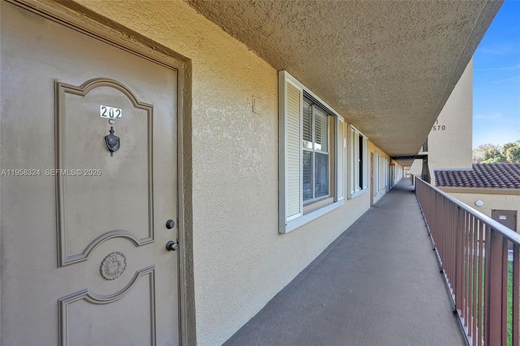 Photo of 4570 NW 18th Avenue #202, Deerfield Beach, FL 33064 (MLS # A11958324)