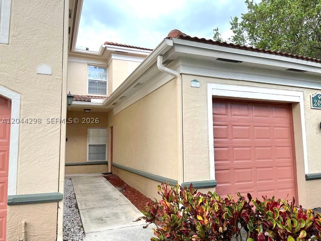 Photo of 2490 Centergate Dr #207, Miramar, FL 33025 (MLS # A12044298)