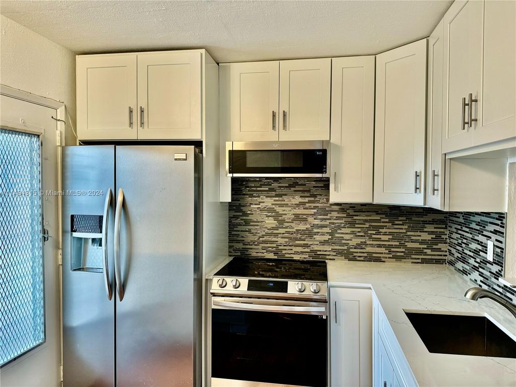 Photo of 901 NE 14th Ave #306, Hallandale Beach, FL 33009 (MLS # A11494815)