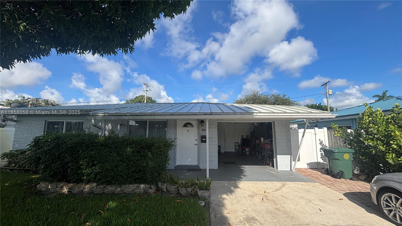 BEAUTIFULLY REMODELED 2/1 HOME in NORTH ANDREWS GARDENS at THIS FANTASTIC PRICE. NEWER ROOF! 20"ceramic tile floors, new paint inside/out, new fixtures, blinds. Completely redone bath w/new tub,sink, vanity. Kitchen w/newer cabinets/counters. Very open=lots of space!