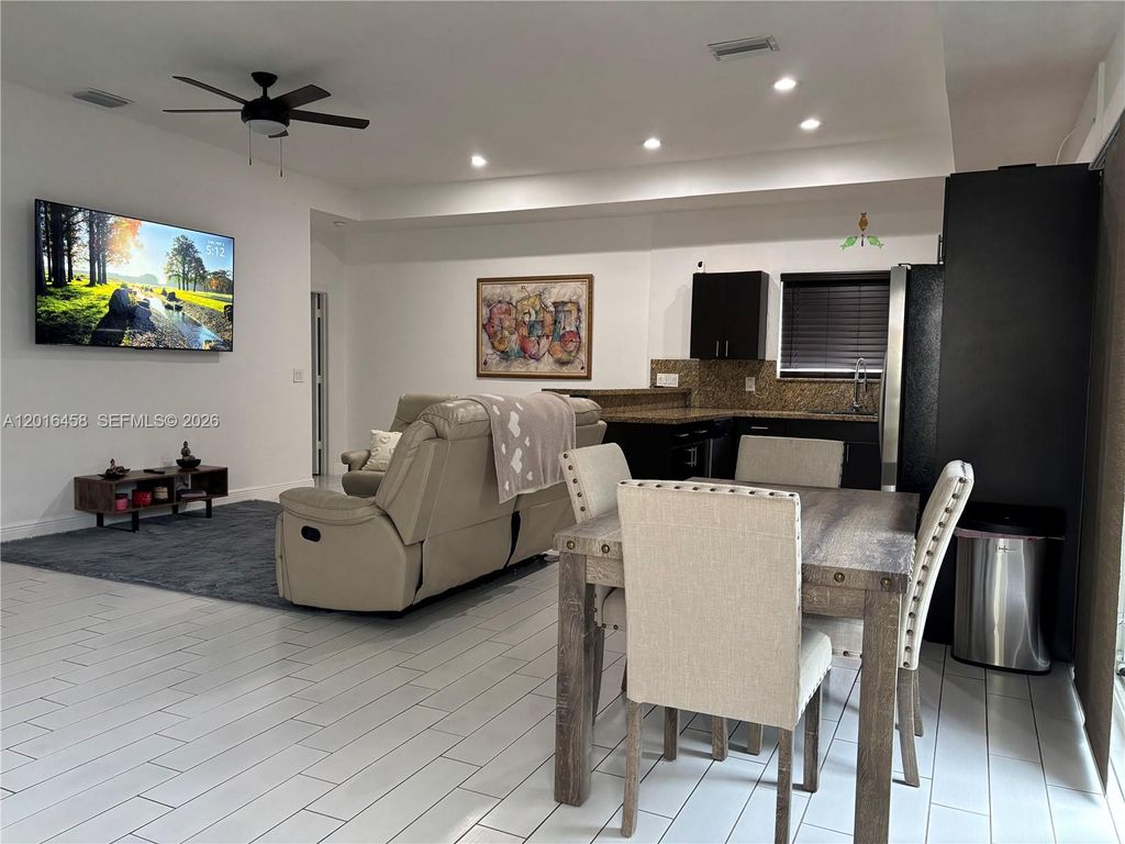 Photo of 1131 SW 86th Ave #1131, Pembroke Pines, FL 33025 (MLS # A12016458)
