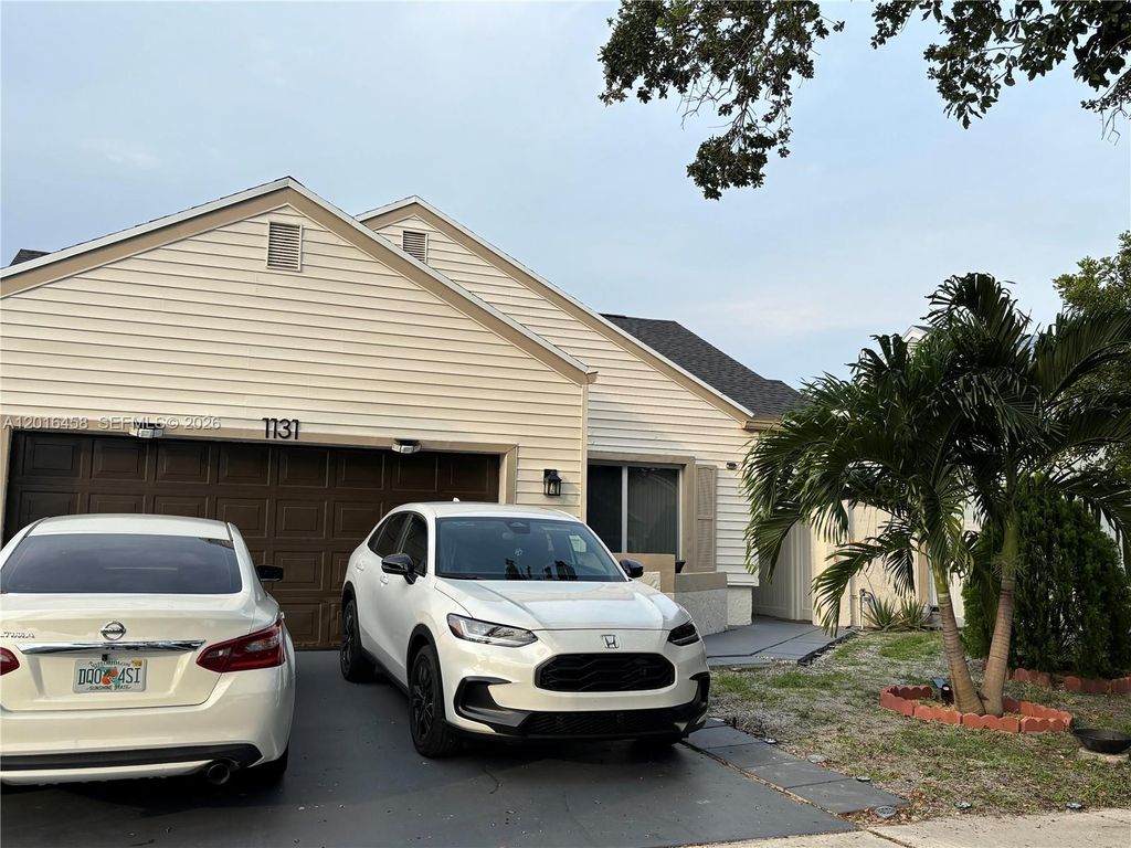 Photo of 1131 SW 86th Ave #1131, Pembroke Pines, FL 33025 (MLS # A12016458)