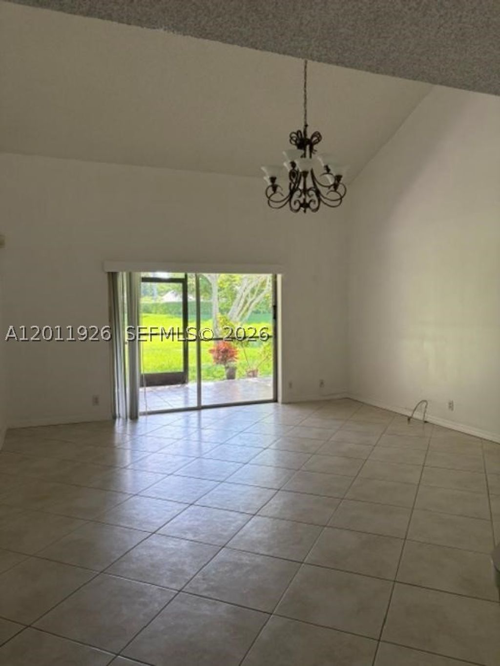 Photo of 667 Woodgate Ln #B, Sunrise, FL 33326 (MLS # A12011926)