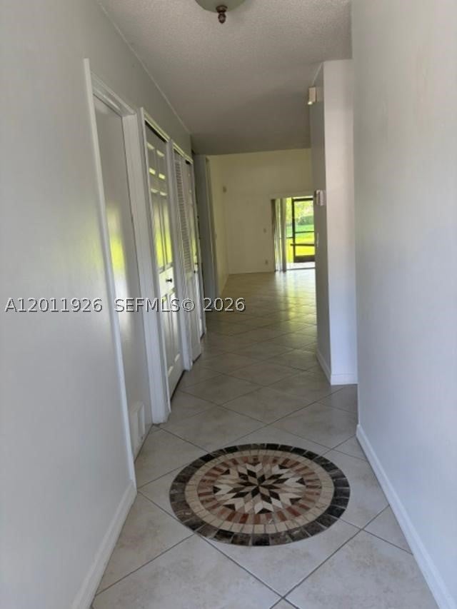 Photo of 667 Woodgate Ln #B, Sunrise, FL 33326 (MLS # A12011926)