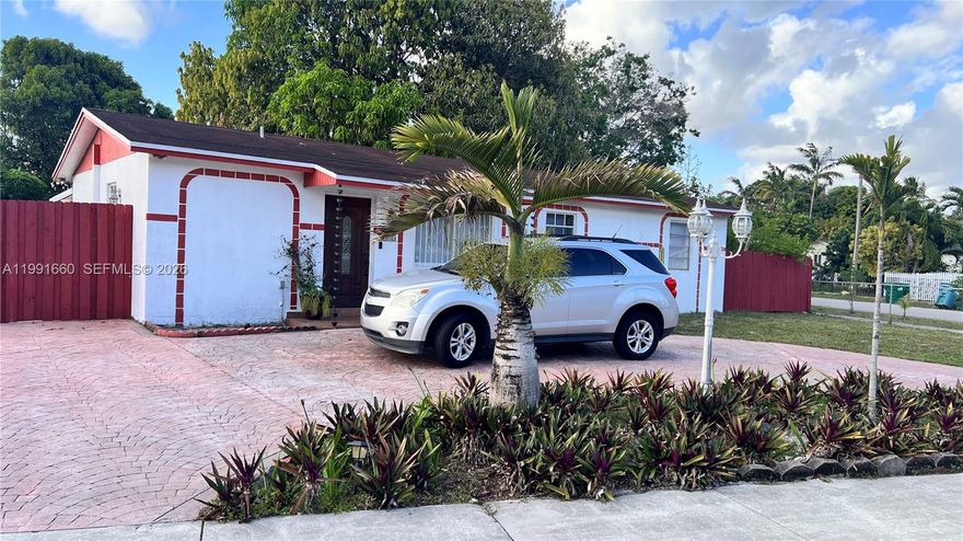 This very nice Miami Gardens corner home, is now available for viewing and ready to move in. It comes with 3 bedrooms, one bath, new A/C unit, large backyard, BBQ area, and lots of natural light throughout the house. This home comes with a large avocado tree & an open patio,  great for entertaining with family gatherings. A side gate that provides convenient access for Boat/RV, perfect for outdoor activities. Plenty parking space in the front with a round driveway to accommodate guests. This property is partially furnished, with option to purchase. Located just blocks from shopping, restaurants, groceries stores, and easy highway access. Very good neighborhood with friendly neighbors. Great place to raise your children.