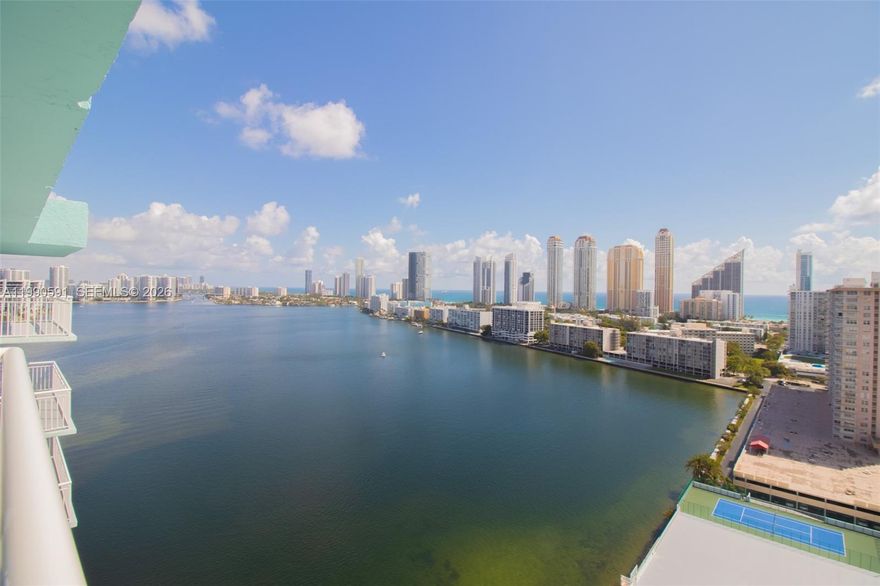 Enjoy beautiful view of the Intracoastal water and ocean from this spacious 2-bedroom, 2-bathroom penthouse. Located in the heart of Sunny Isles Beach just a few steps from the ocean and close to everything. Apartment features 1,488 SF of well-designed living space, with updated open kitchen, and remodeled bathrooms. This bright condo is equipped with modern light fixtures, top of the line appliances and newly installed impact windows. Furniture for sale. Please note that HOA does not permit corporate buyers or leasing of units.