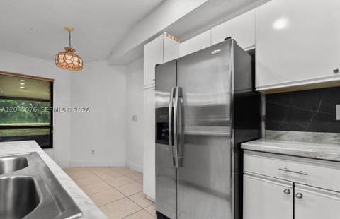 Tiny photo for 3539 W Inverrary Blvd W, Lauderhill, FL 33319 (MLS # A12040076)