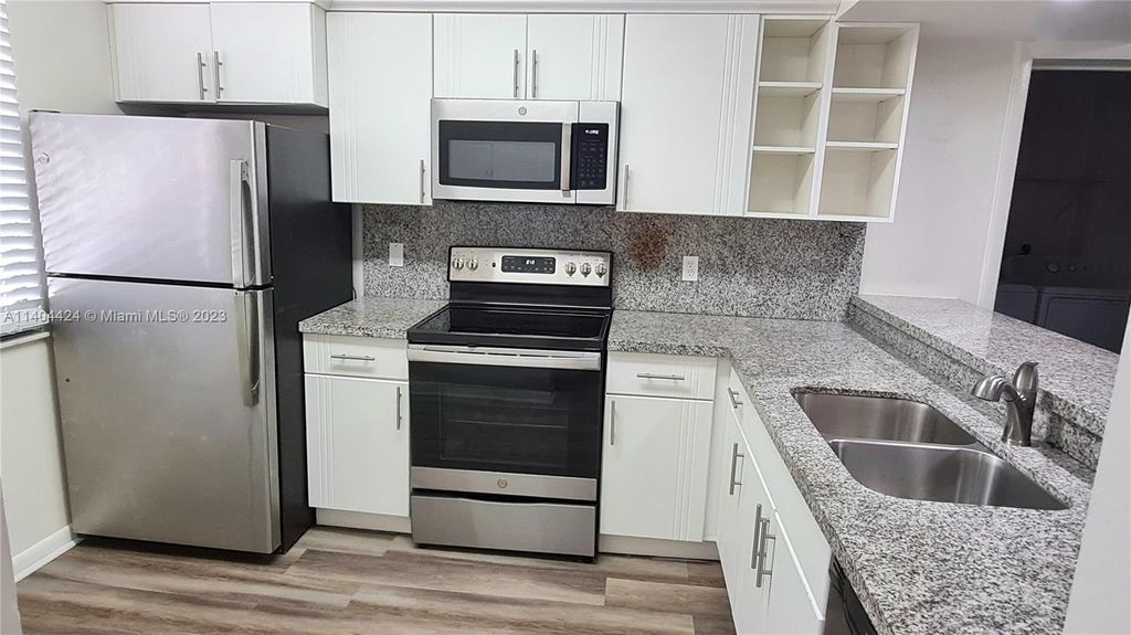 Photo of 3515 Village Blvd #104, West Palm Beach, FL 33409 (MLS # A11404424)