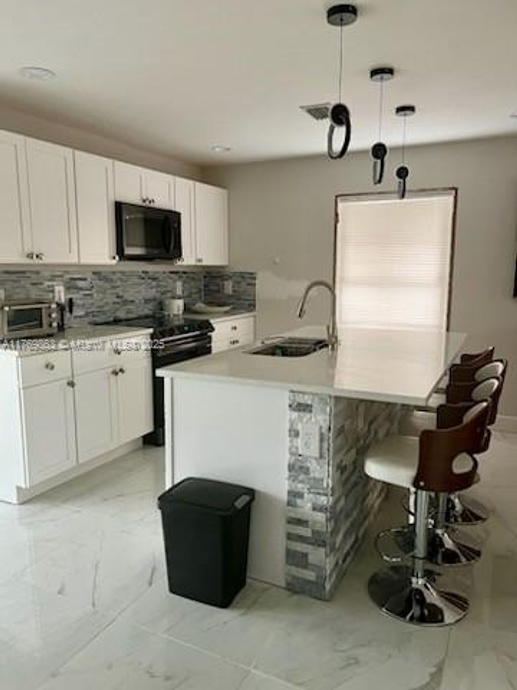 Photo of 418 Winters St, West Palm Beach, FL 33405 (MLS # A11769863)
