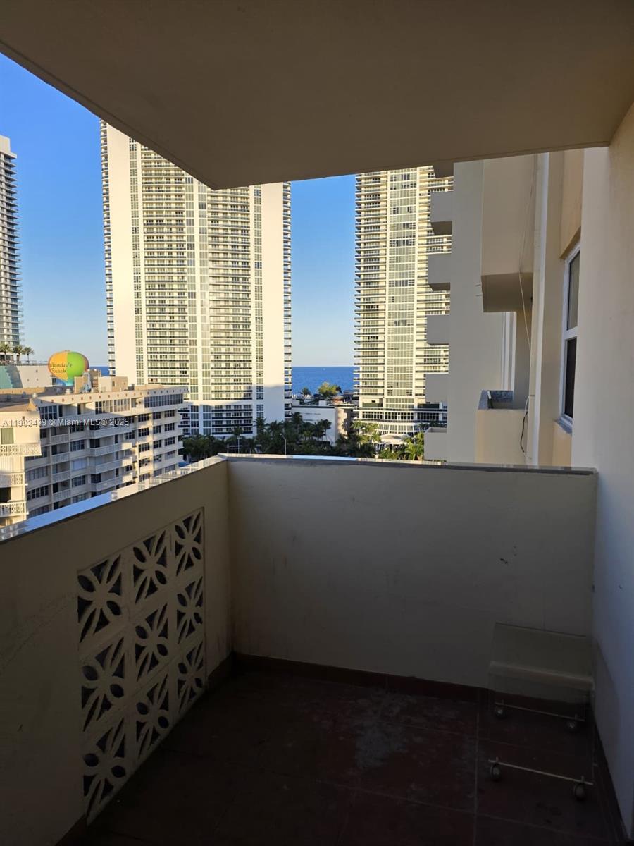 Investor/handyman special! Spacious 1BR + den converted to 2BR/1.5BA, sold As-Is. Located directly across from the ocean—prime beachside location. Great potential to renovate and add value. No rentals allowed during first year of ownership. Priced to sell!