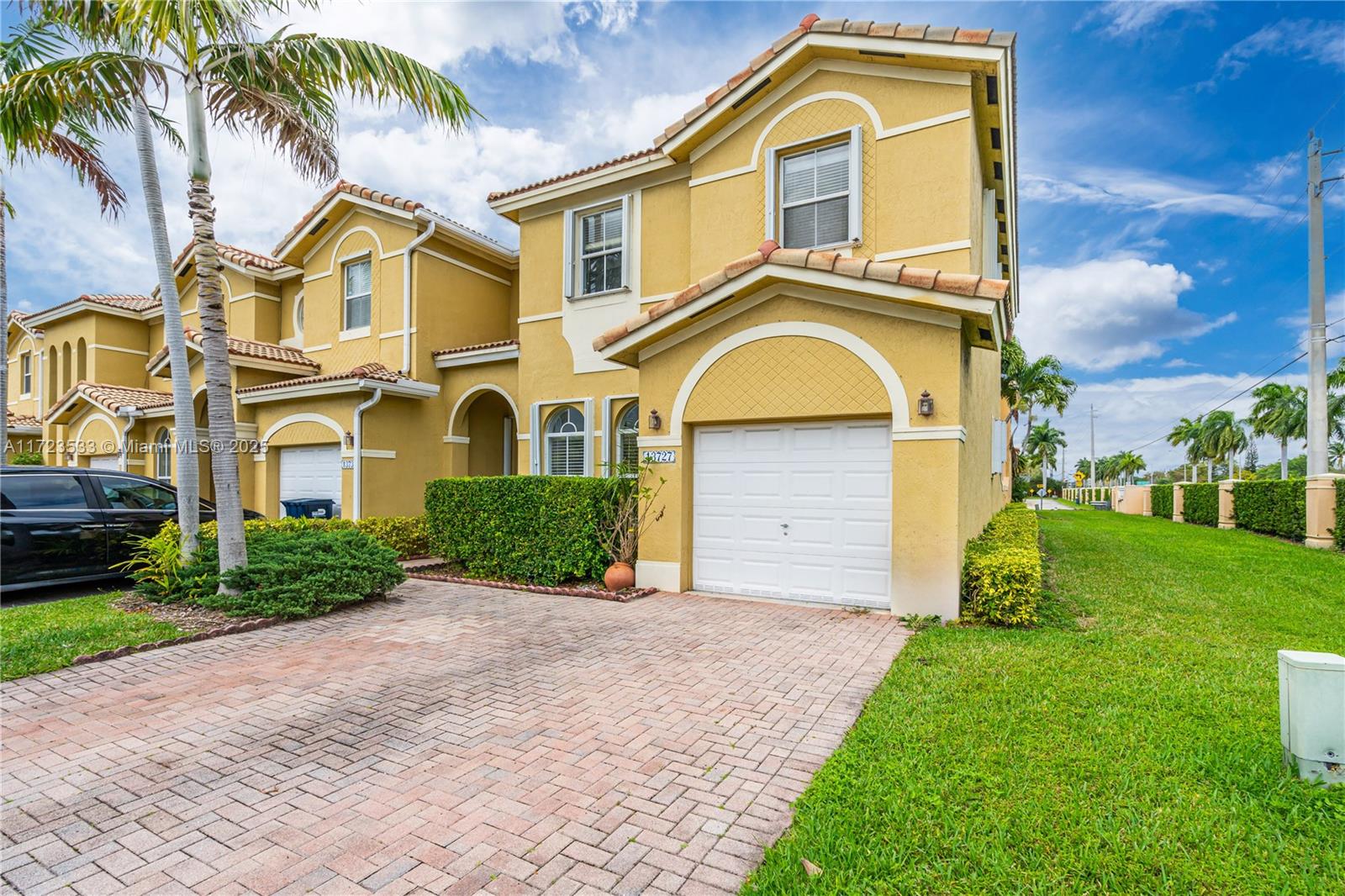 Beautiful 3 bed 2.5 bath townhouse in Kendall Breeze West. This corner unit features a formal living room, a cozy family room & tasteful kitchen perfect for gatherings. The first floor contains a half bath & the family room opens to a private fenced patio. The property also contains a utility room, one car garage, and hurricane shutters. Large master bedroom and master bath with tub and shower. The community is family friendly with a clubhouse, pool and more.