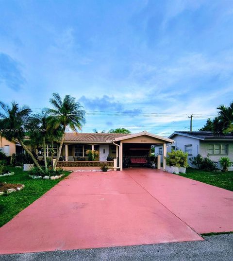 Photo of 8600 NW 57th Ct, Tamarac, FL 33321 (MLS # A12014726)