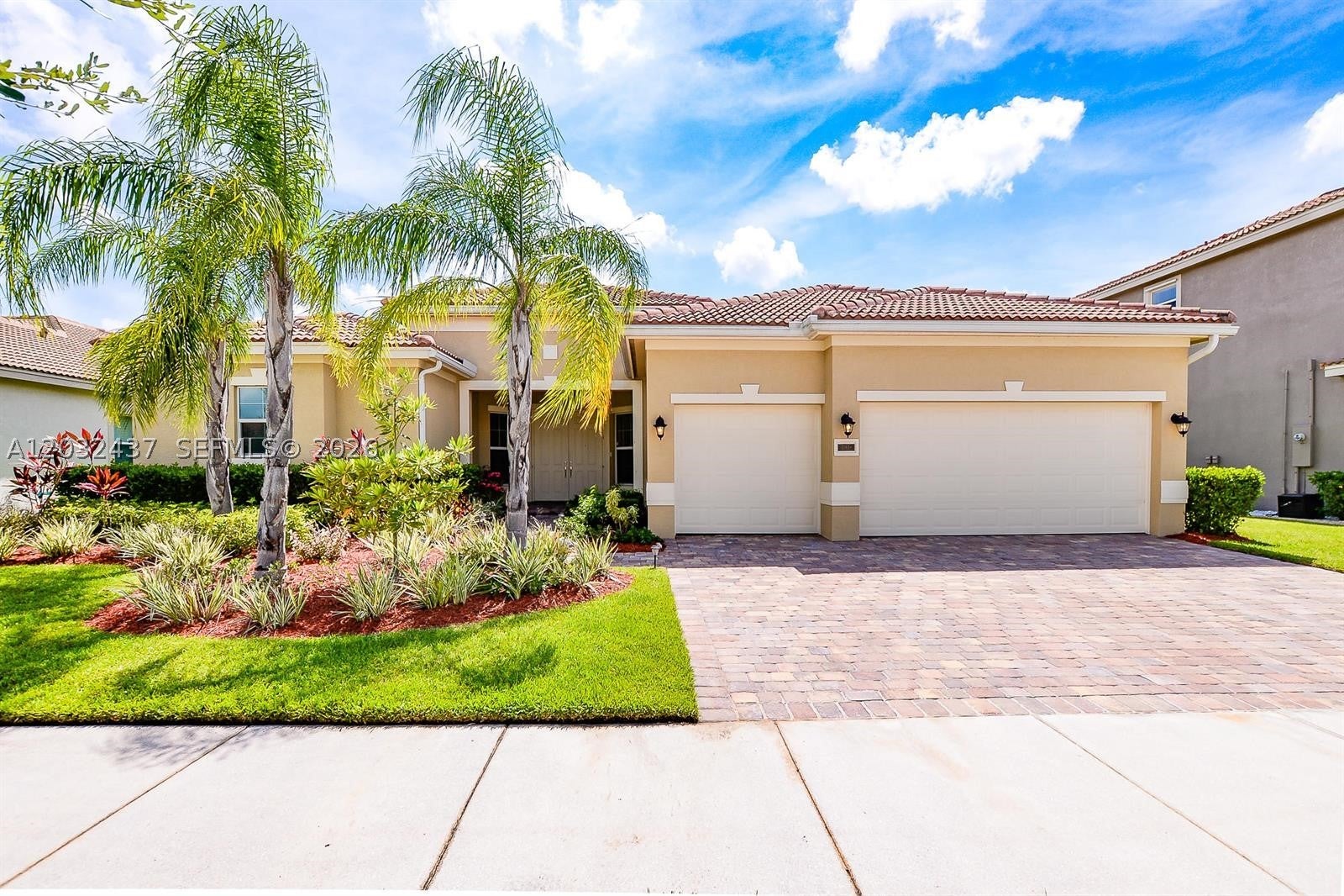 11931 SW Aventino Dr