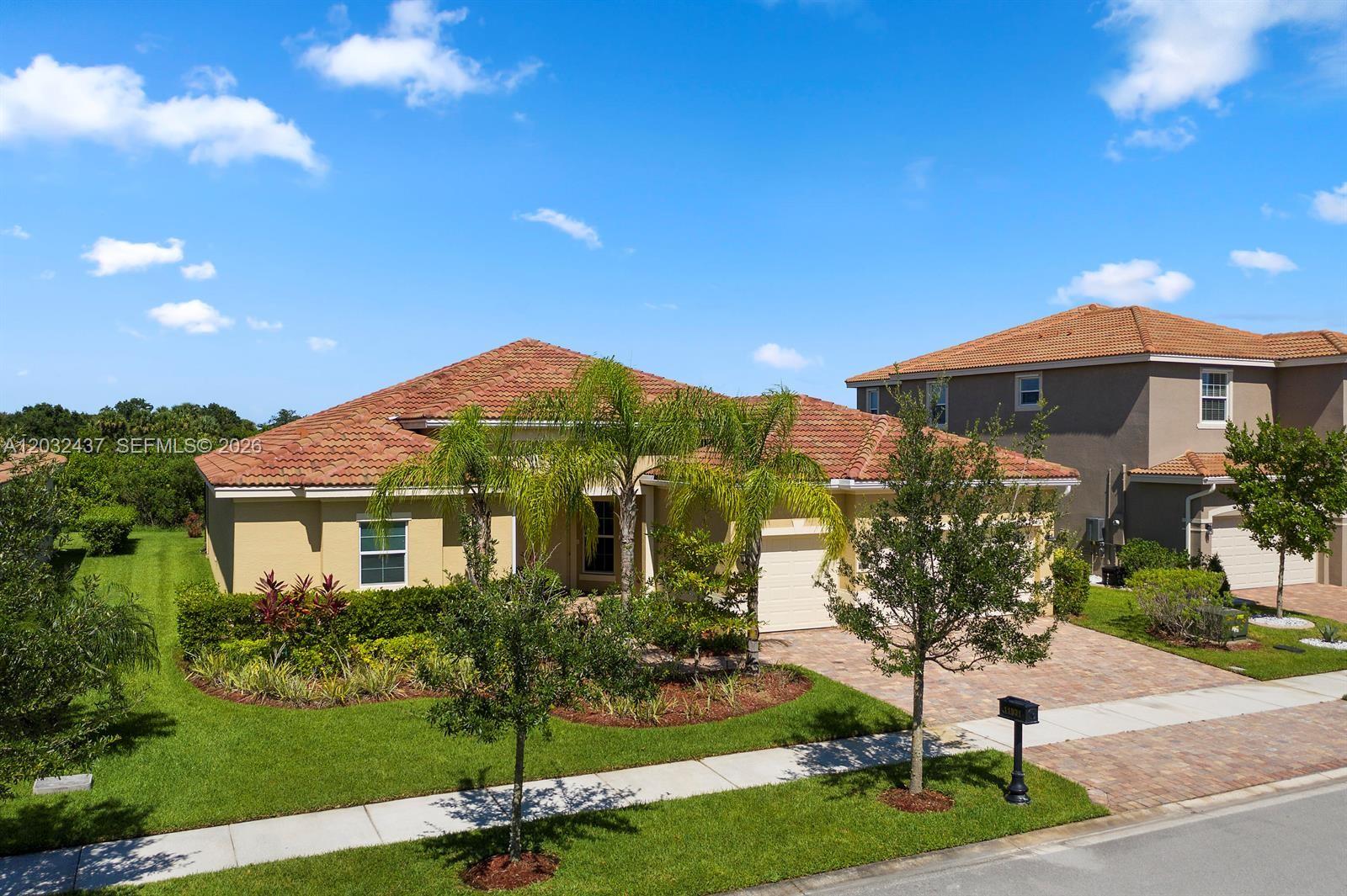 11931 SW Aventino Dr