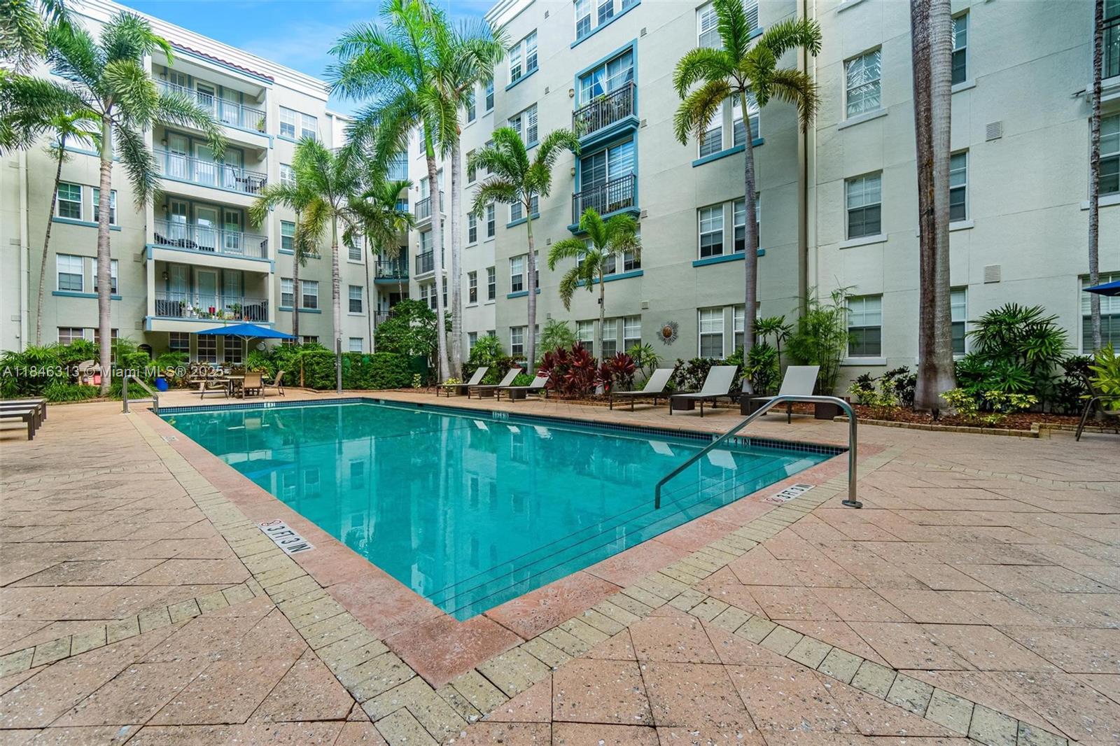 Contemporary style meets downtown convenience! Step into this bright and spacious 2 bedroom, 2 bathroom condo at Sole in vibrant Flagler Village. This move-in-ready unit features rich wooden floors, crown molding, and an open layout that seamlessly flows from the living area to the modern kitchen, complete with stainless steel appliances and granite countertops. Both bedrooms offer generous closet space and privacy thanks to a split floor plan. Additional highlights include an in-unit washer and dryer and secure garage parking. Enjoy resort-style amenities such as a pool, fitness center, club room, and business center. Live just minutes from Las Olas Boulevard, Brightline station, dining, shopping, and nightlife. Experience the best of Fort Lauderdale urban living in this stylish home!