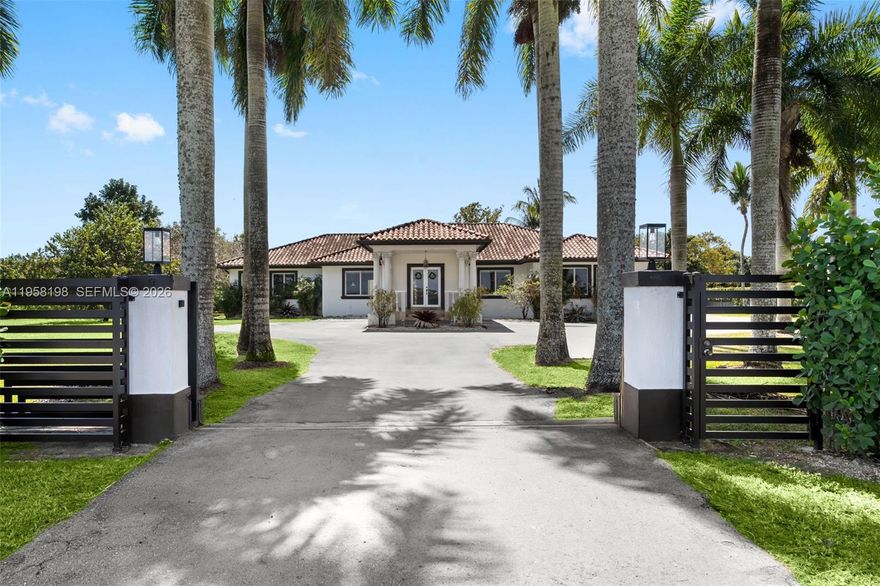 Masterpiece Redlands Mediterranean Estate sitting on 1.5 Acres. Magnificent home features 10ft volume ceilings, top of the Art kitchen, marble floors, formal dining, Florida room overlooking the spectacular pool and lounge areas. This home has many extras including a basketball court, fruit trees, tropical palms, 3 car garage, impact windows. A guest house structure very convenient for friends/family over.  Not enough this masterpiece home includes water filtration system, full house generator, fully fenced, and the tranquility of a very private street.