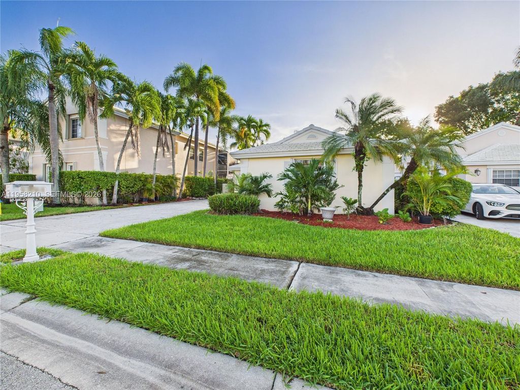 Photo of 1251 E Wilshire Cir E, Pembroke Pines, FL 33027 (MLS # A11958210)