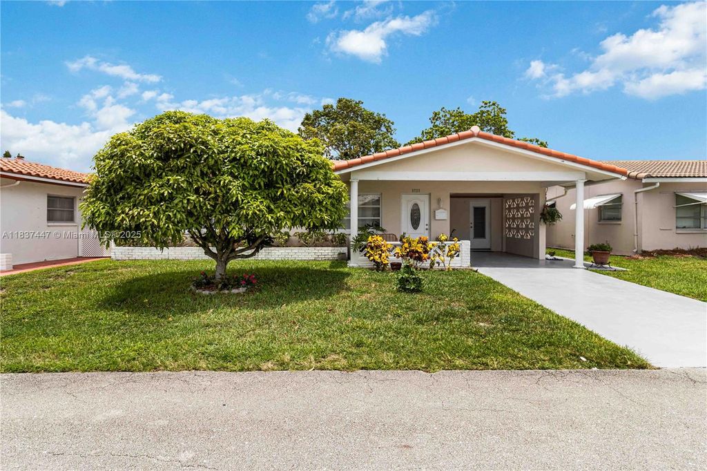 Photo of 5723 NW 86th Ave, Tamarac, FL 33321 (MLS # A11837447)