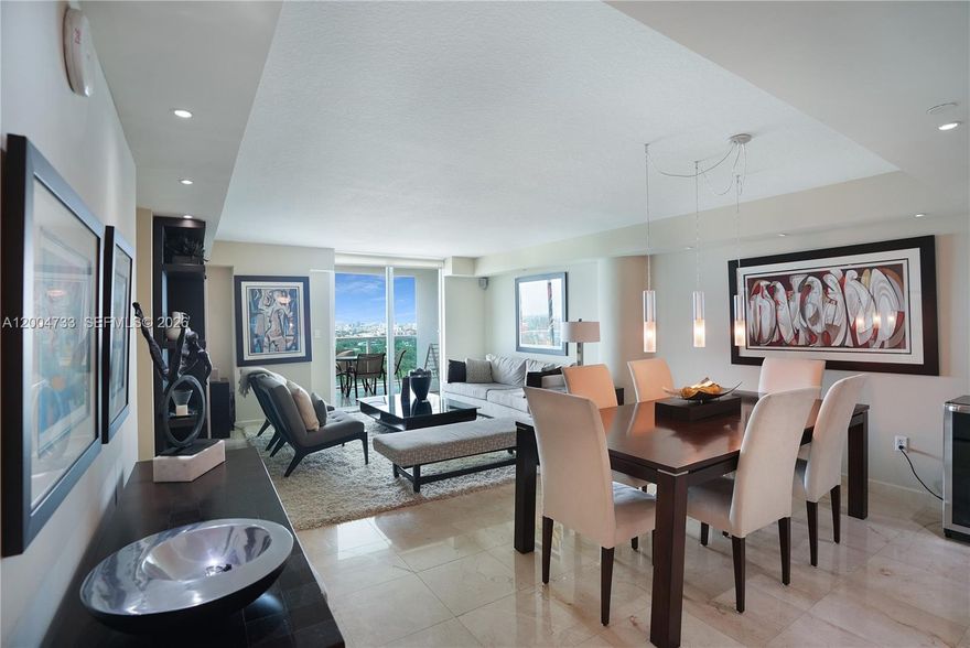 Exquisitely 2B 2Ba renovated corner turn-key unit! Beautiful furniture. Breathtaking skyline views of all of Miami and the bay directly from your bedroom. Marble floors throughout. Walk-in closets, blackouts in bedrooms, stainless steel appliances, granite countertops. Includes 2 parking spaces and a storage unit! Resort-style amenities: Marina, BBQ area, gym overlooking the bay