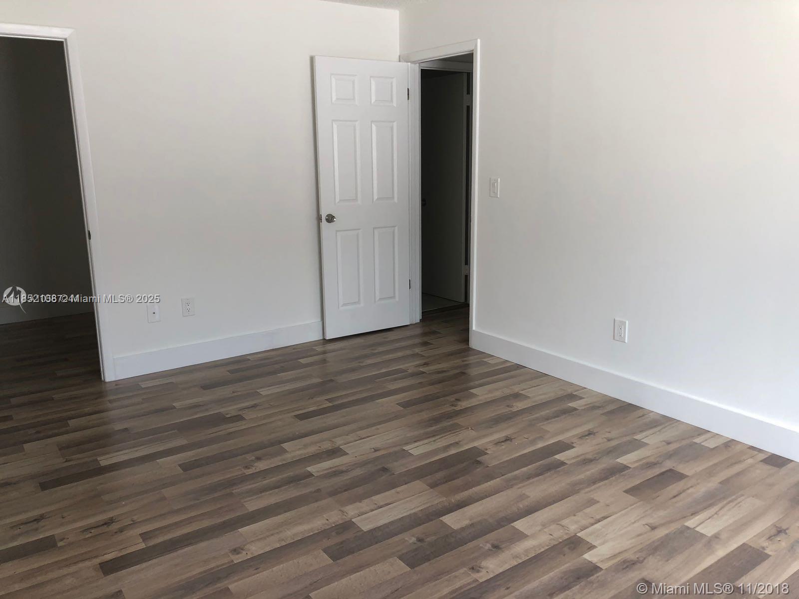 FOR RENT! Charming Townhouse in the beautiful community of Seagrape Village in Homestead. This unit has been remodeled and features 2 bedrooms, 1.5 bathrooms, parquet floors downstairs and wood-laminated floors upstairs, modern bathrooms and granite counter-top in kitchen. Don't miss this chance!