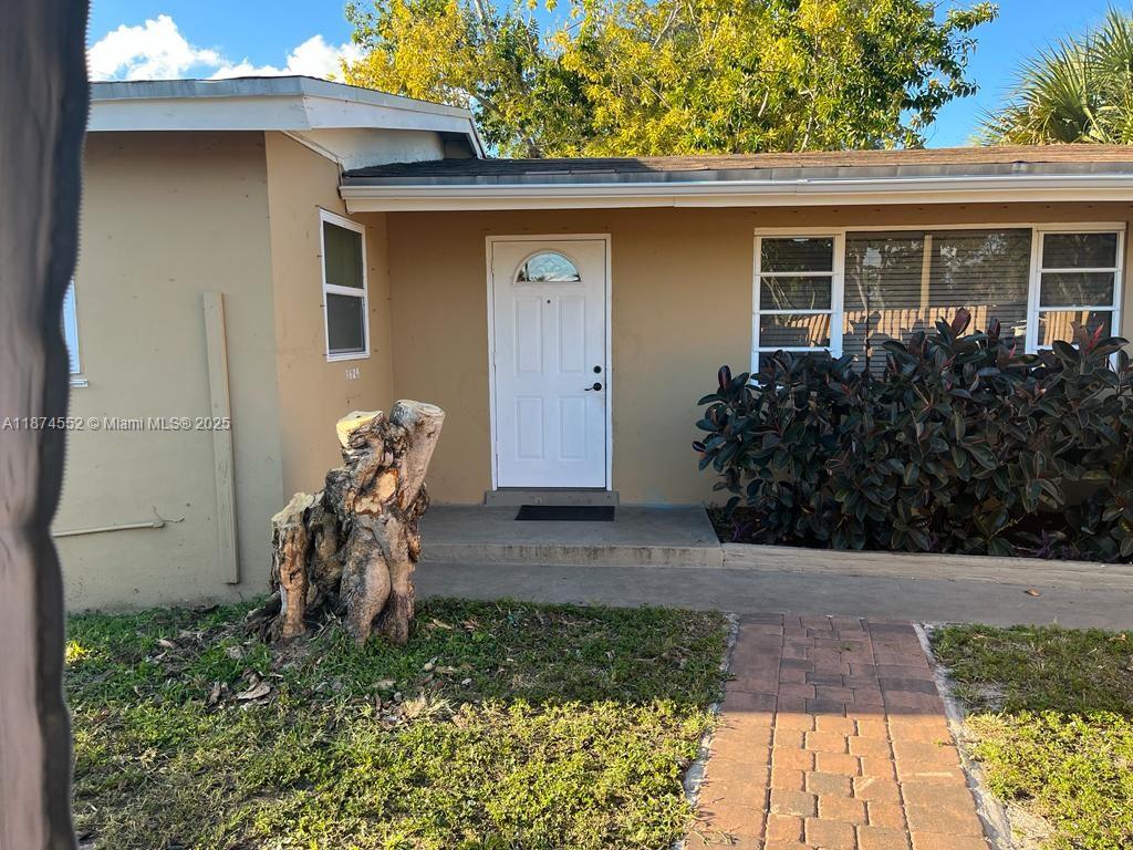 Gorgeous HOUSE, with lot of potential, the house is a 3 bedroom and 2 bathrooms and the family room has been converted into a 4th bedroom with private entrance, plus the house has in the back a studio with full bathroom , huge backyard and a nice terrace to BBQ, on both sides of the house has Gazebos, all Fenced around the backyard and in front of the house, NEW ROOF 2025, Hurricanes panels for all the windows in the house
