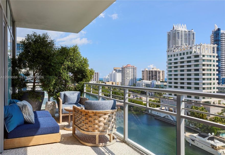 Enjoy private island living at its best as you watch the boats go by while having coffee on your generous terrace! Phenomenal ocean, Intracoastal & Miami skyline views await you from this chic, newly renovated corner apartment by celebrated designer & Martha Stewart co-star, Fernando Wong! This 3BD/3.5BA unit offers the finest finishes including wall to wall sisal carpet, Phillip Jeffries wall paper, Italian Marble Master Bath, black-out shades in master & lighting by Kelly Wearstler, Suzanne Kassler & Ralph Lauren. The stunning kitchen includes Miele double oven/dishwasher/stovetop/exhaust, Sub Zero refrigerator, Electrolux washer/dryer & newer AC/electrical panel. Resort like amenities at this 24hr gated/family friendly community include: 2 parking, valet/doorman, security, 2 pools, spa, gym, & more! It's all about location! Coveted quiet Mid-Beach island set on 8.5 acres, great for kids & pets - minutes to beaches, La Gorce Country Club, JCC, hip dining & shopping! Easy commuting to major highways, airports, downtown, & great schools!
