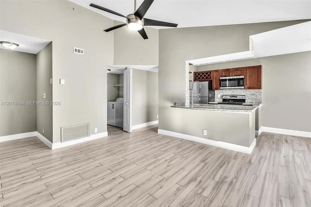 Photo of 5686 Rock Island Rd #127, Tamarac, FL 33319 (MLS # A12013684)
