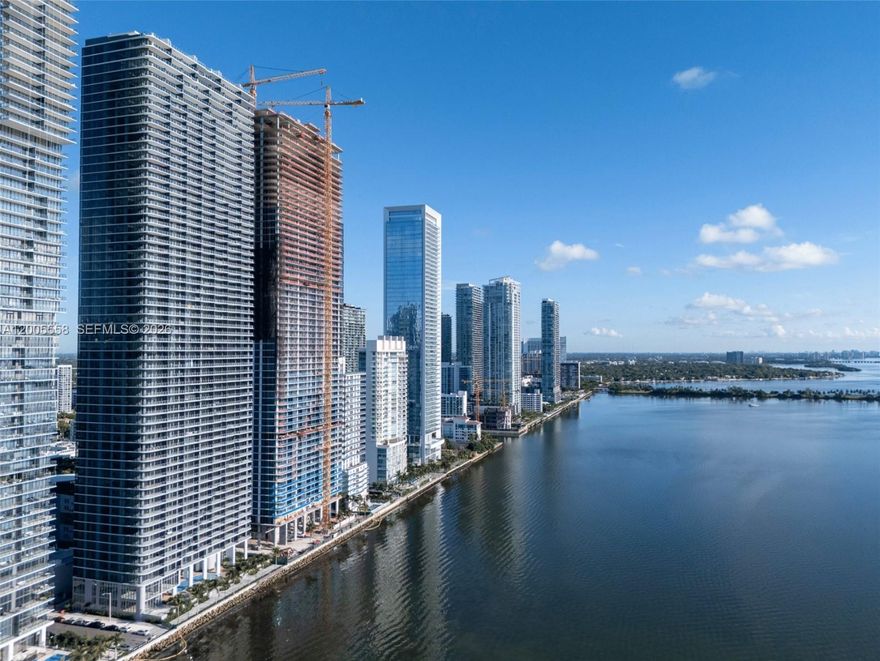 A rare Bay-Level offering in Aria Reserve’s coveted ‘02 A Special’ line, with expansive double-wide (26'-9"x 31'-4") living and dining spaces for elevated entertaining. Residence 3002 offers an intimate connection to Biscayne Bay—where water is felt, not just seen, from your private retreat. Positioned on the 30th floor, this flow-through residence balances elevation with immersion, offering sweeping yet grounded bay views.

Floor-to-ceiling glass frames a double-wide living room filled with natural light, with sunrise reflections at eye level. Open-concept living, premium appliances, and designer-ready finishes complete the space. The primary suite features a spa-inspired open bath with direct bay vistas.

The 30th floor offers a unique vantage—elevated for views, yet close enough for a tactile waterfront experience. The ‘02’ line is the most sought-after for its massive entertaining space with direct bay exposure. Of 29 residences, only two remain available—making 3002 one of the final opportunities within this premier stack.

Enjoy 2+ acres of resort-style amenities: pools, spa, fitness center, courts, lounges, and more. Prime Edgewater location near Wynwood, Midtown, Design District, Downtown, Brickell, and Miami Beach.

Disclaimer: Information deemed reliable but not guaranteed. Buyer to verify.