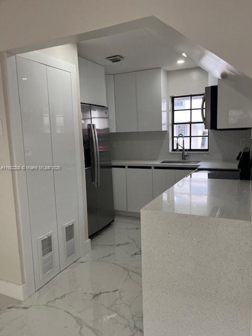 Modern 2 bedroom, 2.5 bath townhouse featuring a private patio and in unit washer and dryer. Each bedroom includes its own full bathroom, plus a convenient half bath on the first floor. The home has been fully remodeled and is move in ready. Only first months rent and security deposit required.