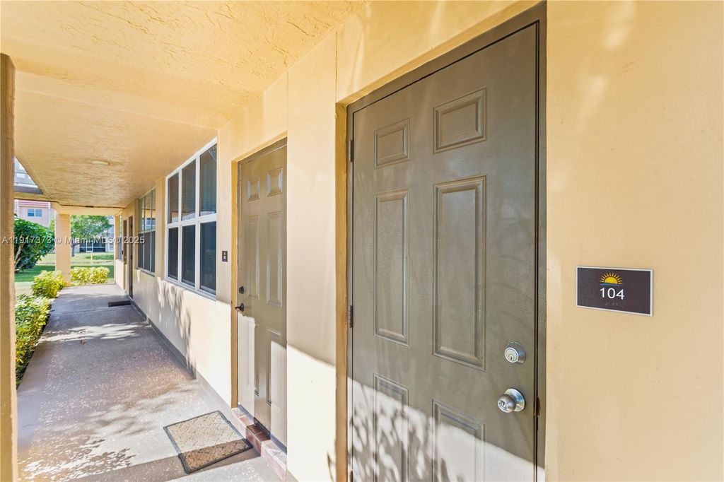 Photo of 9121 Sunrise Lakes Blvd #104, Sunrise, FL 33322 (MLS # A11917373)