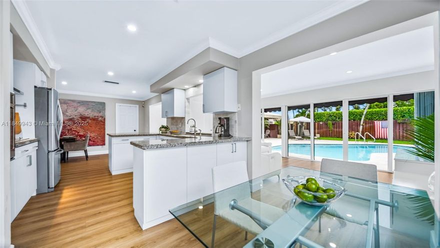 This 3-bed, 2-bath home in Hollywood Hills brings the Florida lifestyle to life. Step inside to an open, easy-flow layout with an updated kitchen and clean finishes—but the real magic is out back. Sliding doors open to a private tropical retreat with a sparkling pool and two shaded seating areas—one under a retractable awning, the other beneath a vinyl-topped frame—perfect for outdoor dining, relaxing, or weekend get-togethers. The enclosed garage adds flexibility—use it as an office, gym, or convert it back. Located near parks, top schools, shopping, major highways, and places of worship. Stylish, functional, and ready to welcome you home.