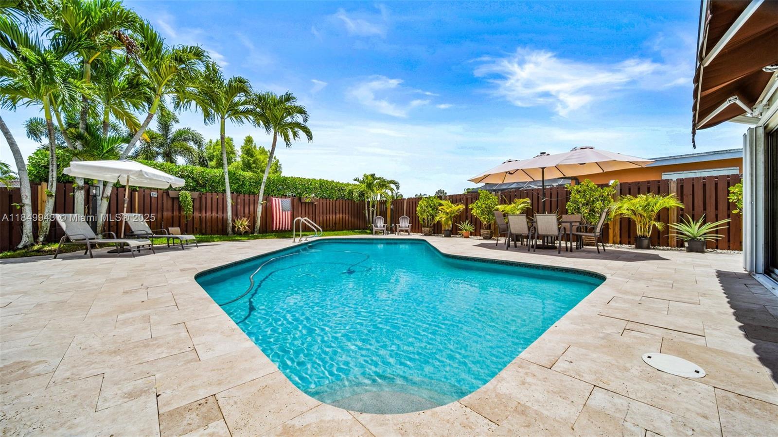 This 3-bed, 2-bath home in Hollywood Hills brings the Florida lifestyle to life. Step inside to an open, easy-flow layout with an updated kitchen and clean finishes—but the real magic is out back. Sliding doors open to a private tropical retreat with a sparkling pool and two shaded seating areas—one under a retractable awning, the other beneath a vinyl-topped frame—perfect for outdoor dining, relaxing, or weekend get-togethers. The enclosed garage adds flexibility—use it as an office, gym, or convert it back. Located near parks, top schools, shopping, major highways, and places of worship. Stylish, functional, and ready to welcome you home.