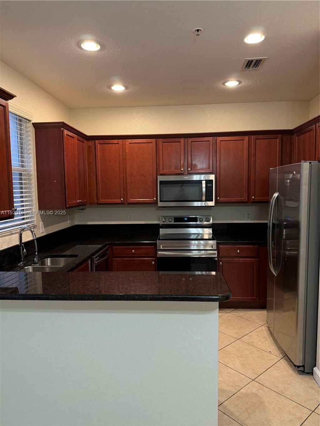 Photo of 12440 Emerald Creek Mnr #17, Plantation, FL 33325 (MLS # A11929150)